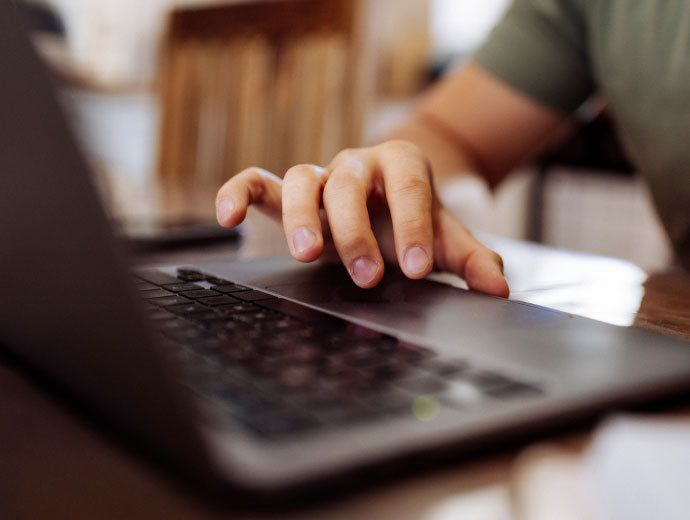 a person on their laptop computer